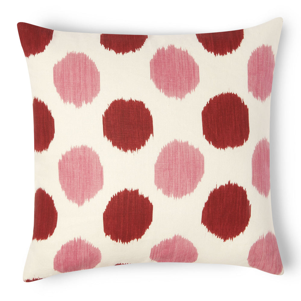 You'll enjoy this  white linen pillow with red and pink circles.