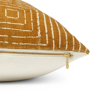 This is upclose view of our mudcloth pillow with the YKK exposed brass zipper showing the donut pull.