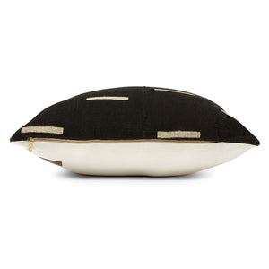 This full side view of the Afra Mud Cloth pillow is black with cream color lines.  It shows the YKK exposed brass zipper and faux leather patch on the back