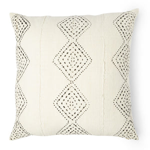 You'll enjoy this white mud cloth pillow with black dots in a  geometric shape. in three rows